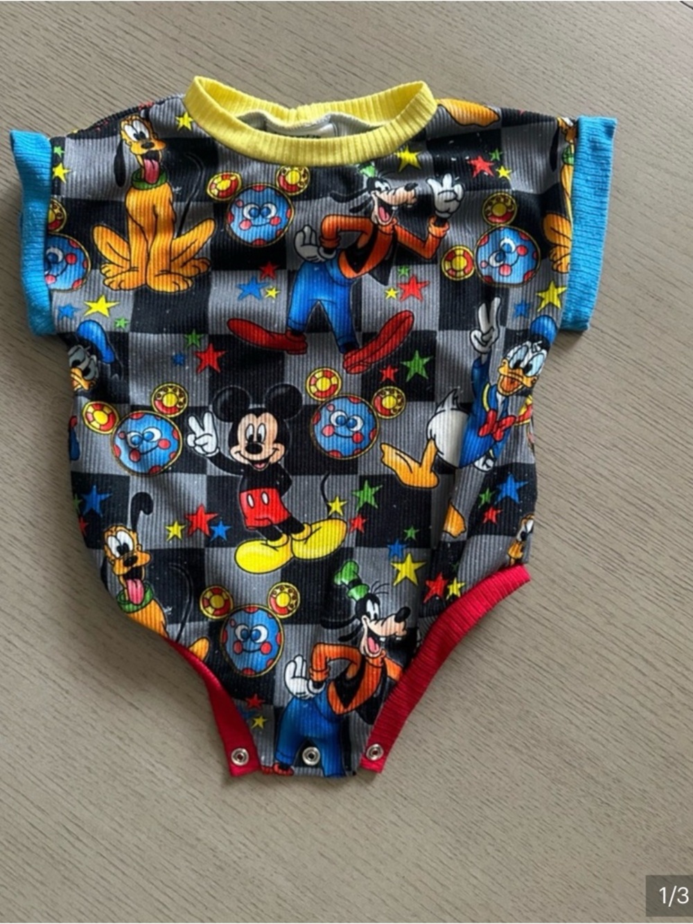Mickey Mouse Black Graphic Kids One-Piece Bodysuit with Color Trim